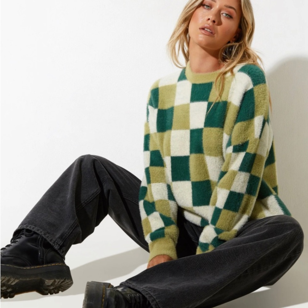 Sweater by Motel,S soft with loose fit. Long sleeves green and cream checkered!